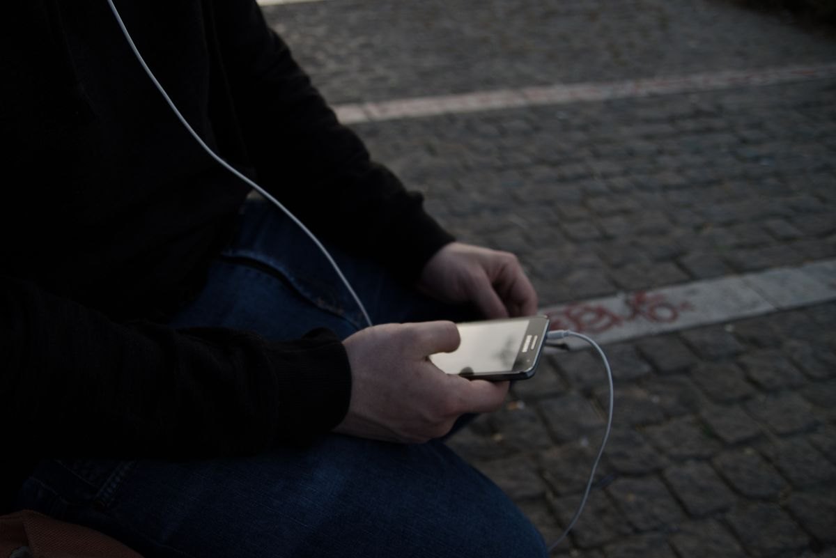 Person using a smartphone while travelling