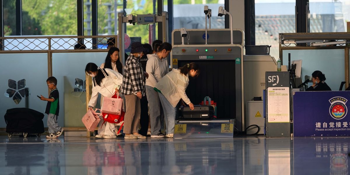 Passengers at airport security
