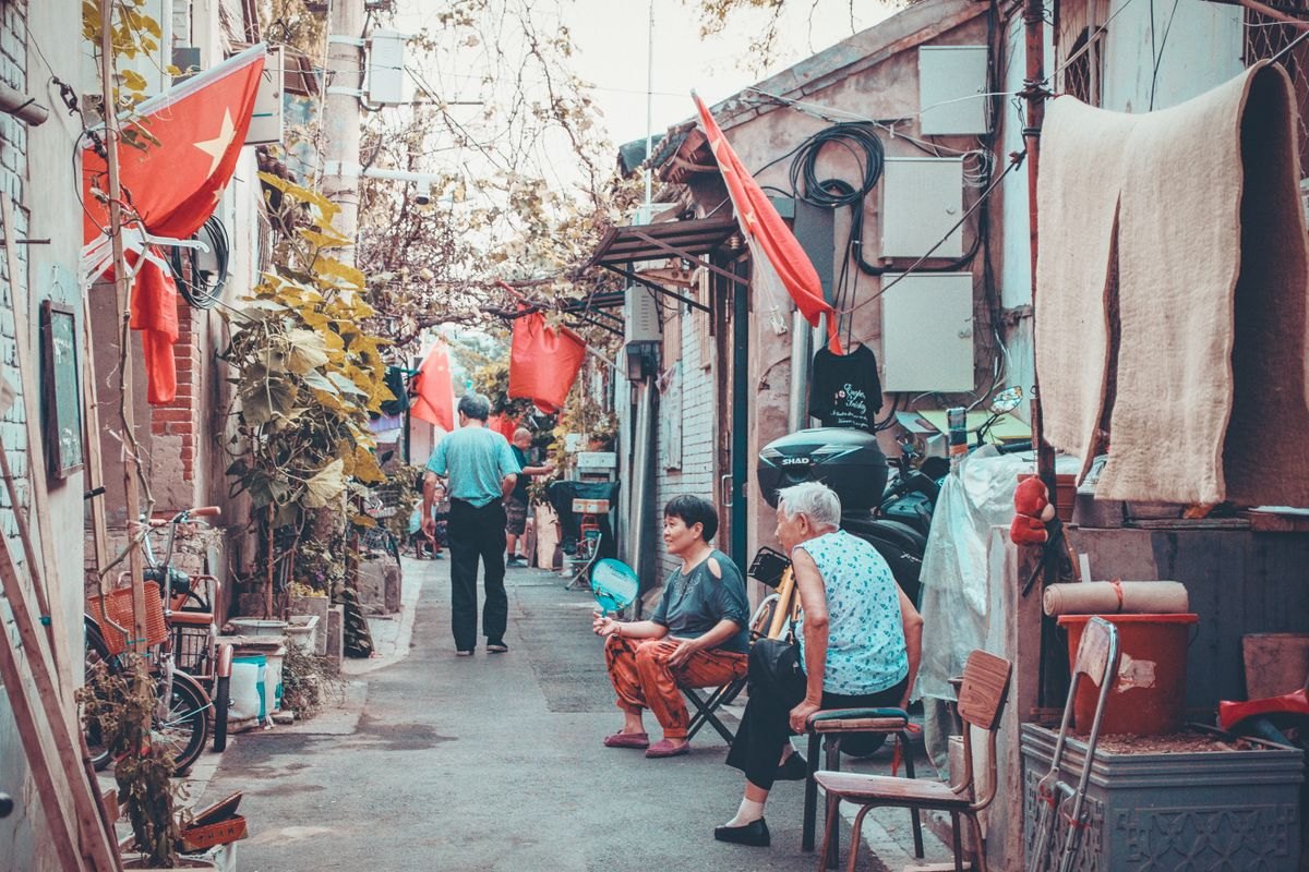 Two people in a Beijing alley