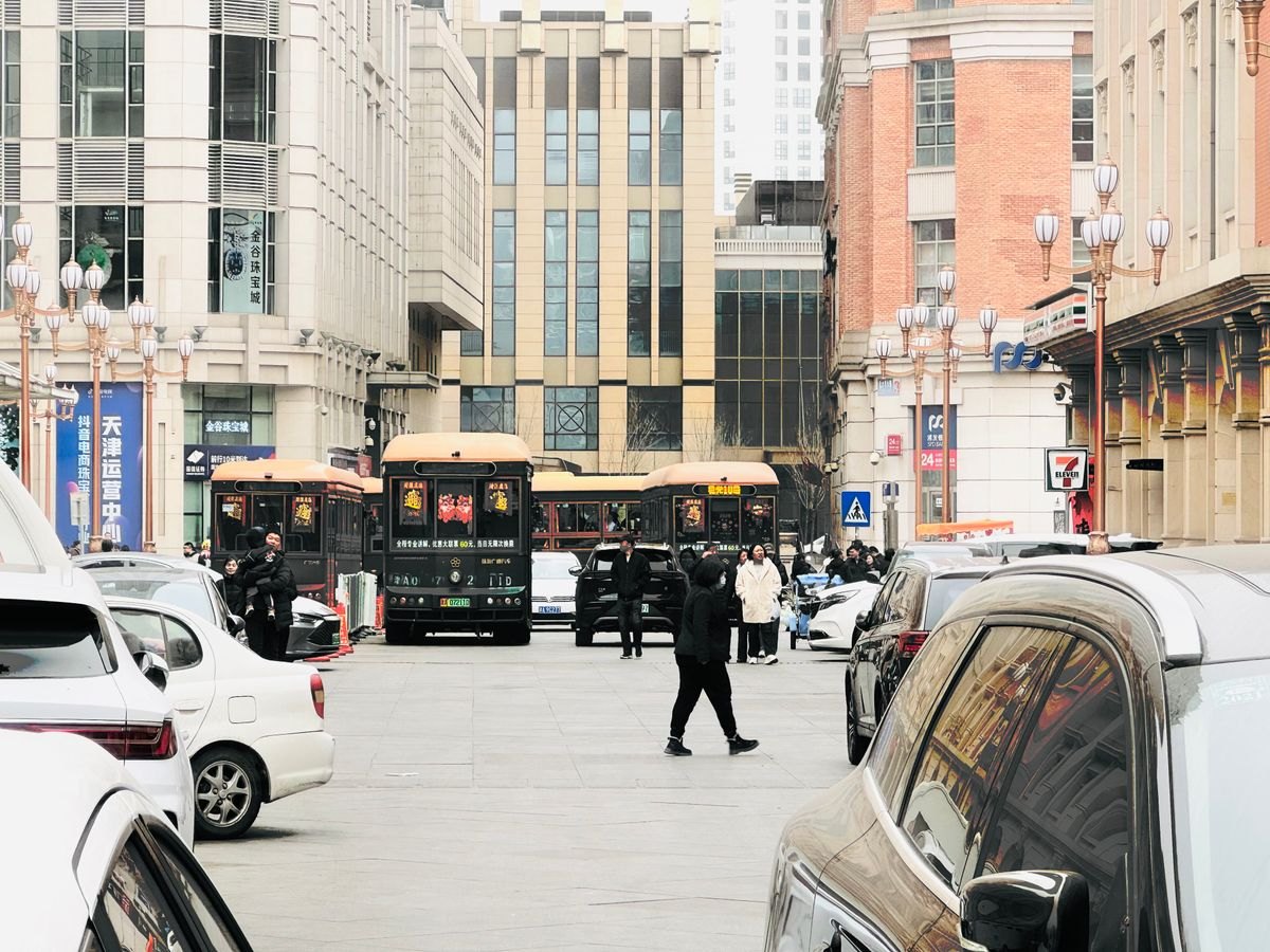 People walking on a Chinese city street