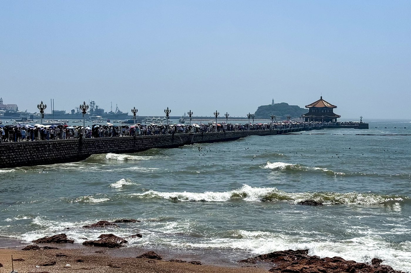 Qingdao Seafront Day: Piers, Hills and Red Roofs