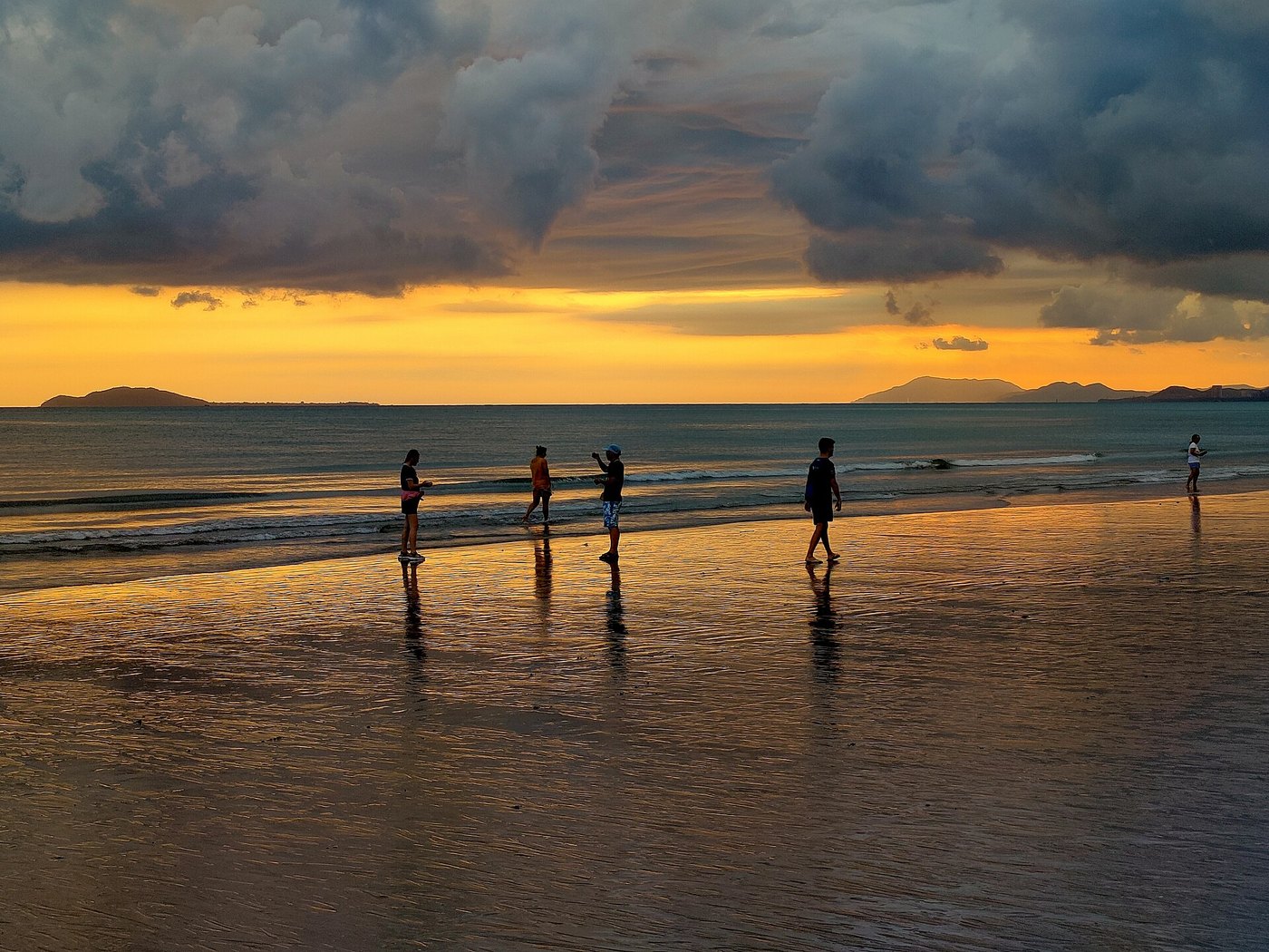 Sanya sunset beach people