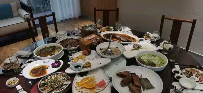 新伟明饭店(季景路)